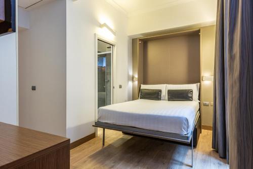 Habitación Cuádruple del hotel Trevi. Foto 4