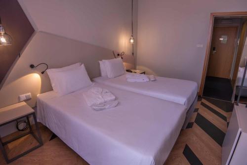Habitación Doble Deluxe - 2 camas del hotel Azoris Angra Garden. Foto 5