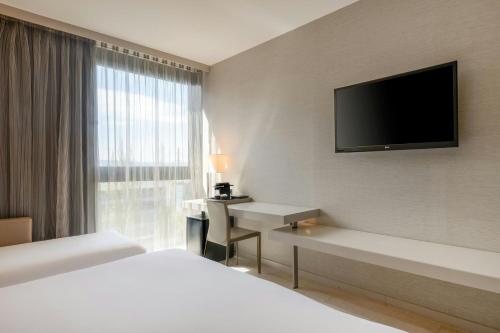 Habitación Triple del hotel Ac San Cugat By Marriott. Foto 3