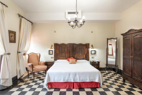 Habitación con cama extragrande. del hotel São João De Deus By Ridan Hotels. Foto 2
