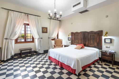 Habitación con cama extragrande. del hotel São João De Deus By Ridan Hotels. Foto 4