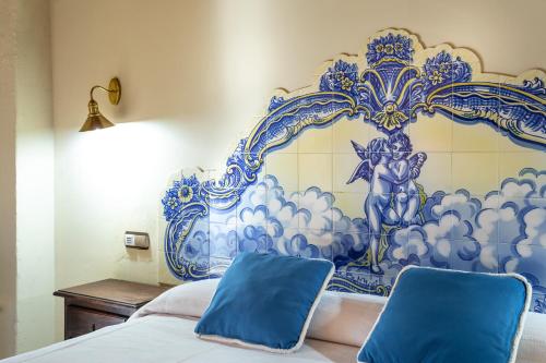 Habitación con cama extragrande. del hotel São João De Deus By Ridan Hotels. Foto 14