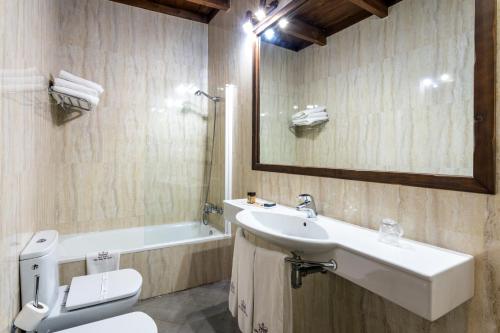 Habitación Triple del hotel São João De Deus By Ridan Hotels. Foto 5
