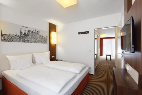 Suite de 2 habitaciones con balcón del hotel Best Western Nuernberg City West. Foto 3
