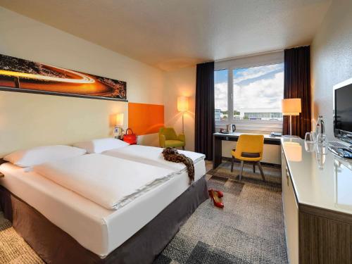 Habitación Doble Estándar del hotel Mercure Köln West. Foto 1