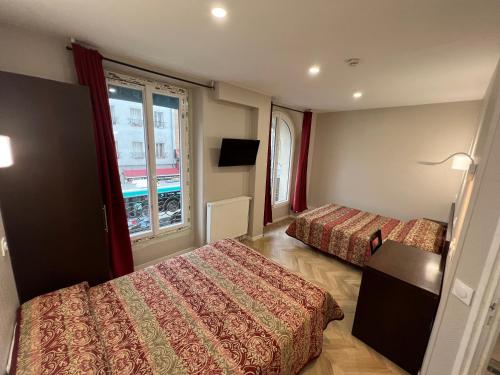 Habitación cuádruple del hotel Hipotel Paris Printania Maraîchers