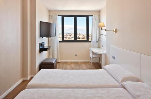 Habitación Doble con vistas a la catedral - 1 o 2 camas del hotel Palladium. Foto 3