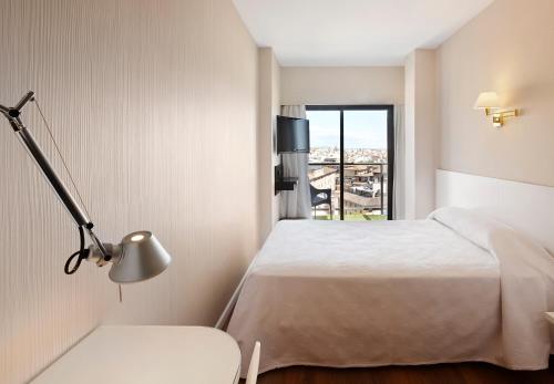 Habitación Individual con balcón y vistas a la catedral del hotel Palladium