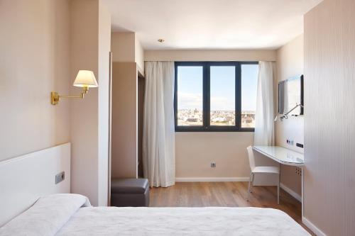 Habitación Doble del hotel Palladium. Foto 1