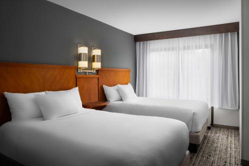Habitación con dos camas dobles (con sofá - cama) del hotel Hyatt Place Dallas-north/by The Galleria. Foto 1