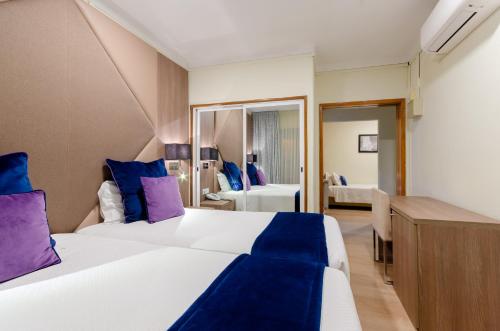 Habitación Triple Superior del hotel Inn Rossio. Foto 6