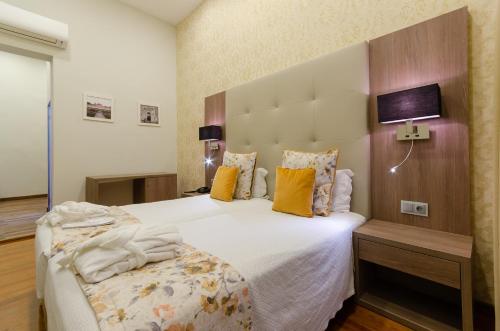 Habitación Triple Superior del hotel Inn Rossio. Foto 8
