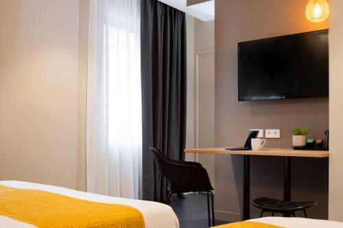 Estudio Triple Estándar del hotel 37 Lodge La Défense Courbevoie. Foto 1