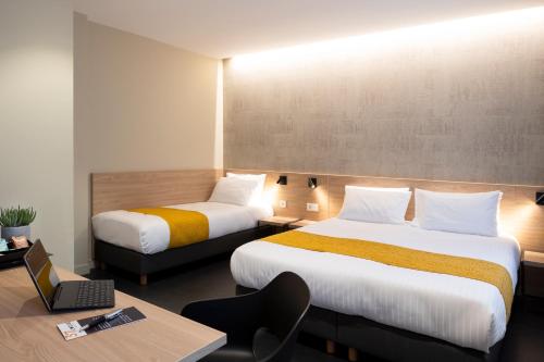 Estudio Triple Estándar del hotel 37 Lodge La Défense Courbevoie. Foto 2