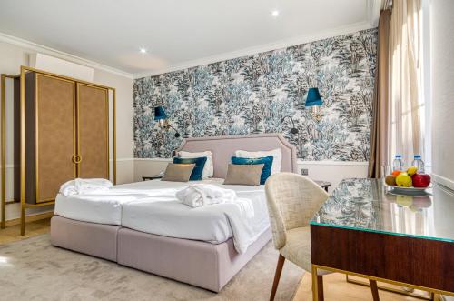 Habitación Doble Superior con vistas al barrio de Chiado - 2 camas del hotel Borges Chiado. Foto 4