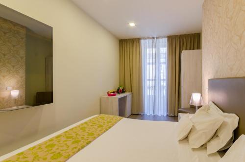 Habitación Doble Superior con vistas al barrio de Chiado del hotel Borges Chiado. Foto 3