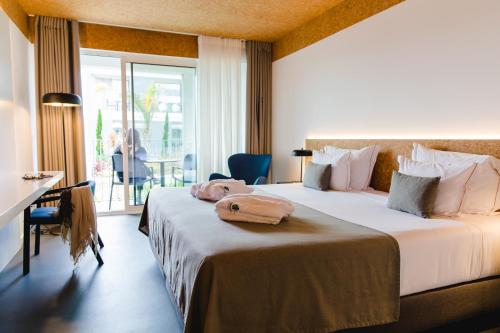 Habitación con cama extragrande. del hotel Canadiano - Urban Nature. Foto 7