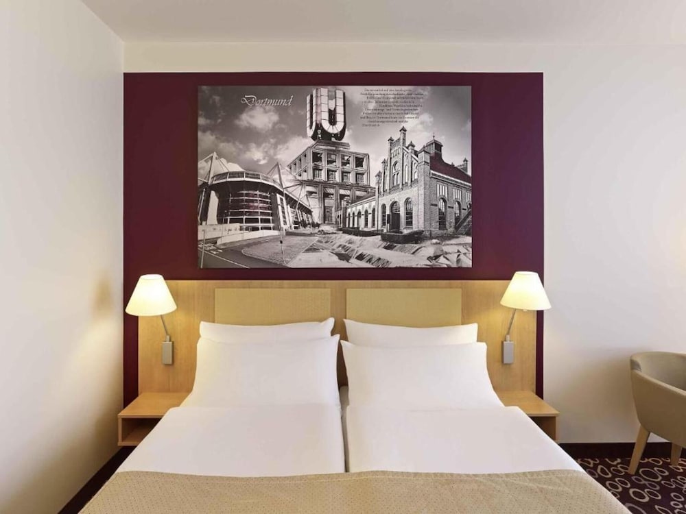 Habitación estándar con cama king o dos camas individuales del hotel Mercure Dortmund City. Foto 2
