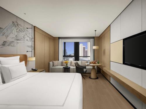 Swiss Executive King Room with Lounge Access - High Floor del hotel Swissôtel Beijing Hong Kong Macau Center. Foto 3
