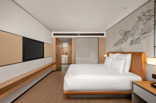 Swiss Grand Executive King Room with Lounge Access del hotel Swissôtel Beijing Hong Kong Macau Center. Foto 5