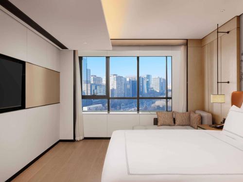 Swiss Executive Suite with one King - size bed, Lounge Access del hotel Swissôtel Beijing Hong Kong Macau Center. Foto 1