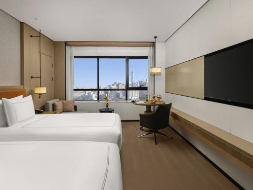Swiss Select Twin Room del hotel Swissôtel Beijing Hong Kong Macau Center