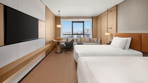 Swiss Select Twin Room del hotel Swissôtel Beijing Hong Kong Macau Center. Foto 6