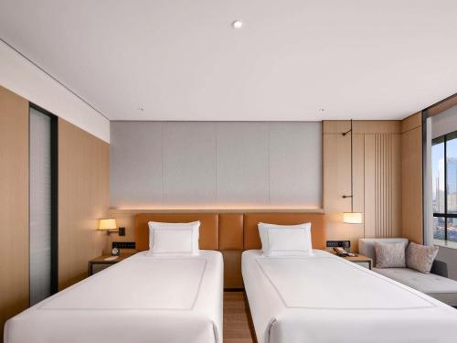 Swiss Executive Twin Room with Lounge Access - High Floor del hotel Swissôtel Beijing Hong Kong Macau Center. Foto 4