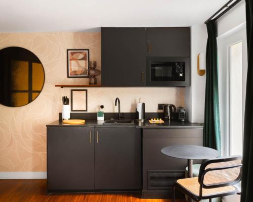 Suite Confort del hotel Makom Montmartre. Foto 7