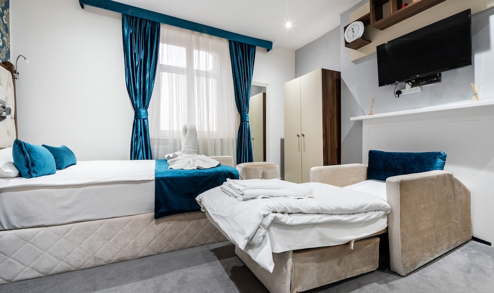 Habitación triple Confort, baño privado del hotel Vilenza. Foto 9