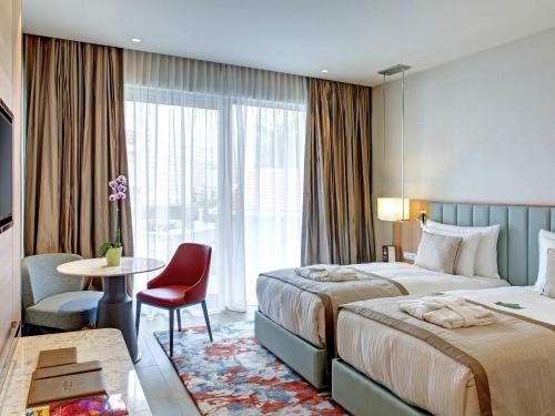 Habitación Doble Estándar con vistas al parque del hotel Rixos Premium Dubrovnik. Foto 3