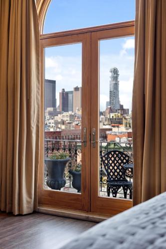 Alojamiento Quintessential con cama extragrande y balcón del hotel Blue Moon. Foto 7