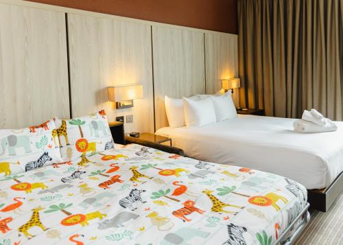 Habitación con sofá cama - 1 cama grande del hotel DoubleTree By Hilton London Excel. Foto 2