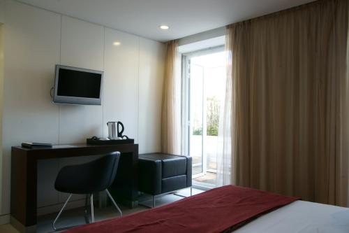 Oferta Especial - Habitación Doble 1 o 2 camas con paquete romántico del hotel Jerónimos 8. Foto 3
