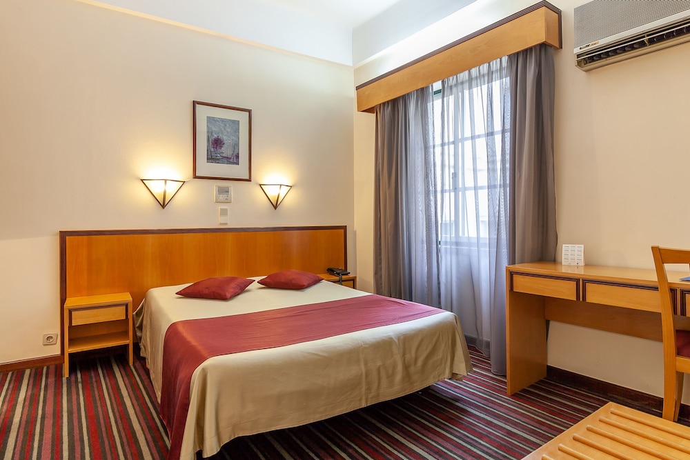 Habitación estándar con 1 cama doble o 2 individuales del hotel Residencial Horizonte. Foto 4