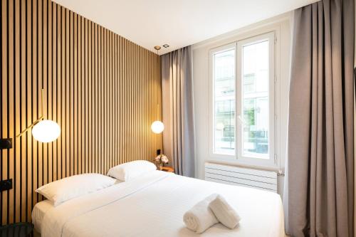 Suite del hotel AU COEUR DU MARAIS. Foto 11