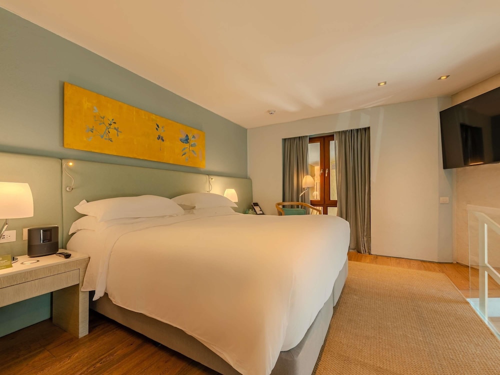 SUITE SPA con 1 cama king size, terraza con bañera de hidromasaje, dos plantas y mayordomo del hotel Sofitel Legend Santa Clara Cartagena