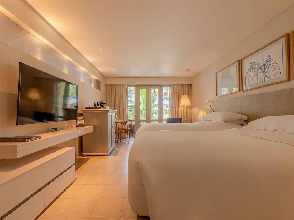 Habitación Superior con 2 camas individuales, terraza y vistas al jardín del hotel Sofitel Legend Santa Clara Cartagena. Foto 15