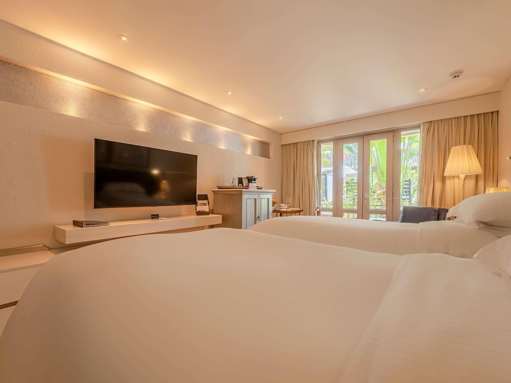 Habitación Superior con 2 camas individuales, terraza y vistas al jardín del hotel Sofitel Legend Santa Clara Cartagena. Foto 16