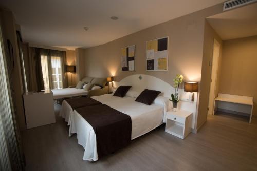 Habitación Familiar del hotel Sercotel Torico Plaza. Foto 1