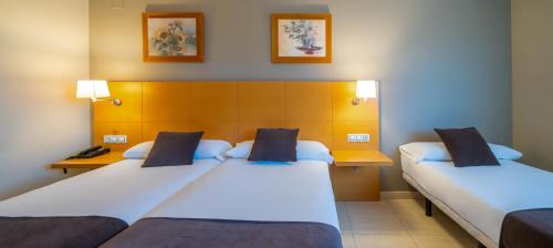 Habitación Doble con Cama supletoria del hotel La City Estación. Foto 5
