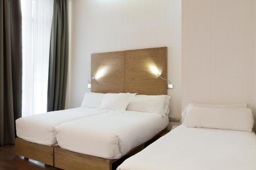 Habitación Triple del hotel Petit Palace Plaza Málaga. Foto 4