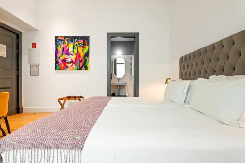 Habitación Doble con vistas al interior - 1 o 2 camas del hotel Joya del Casco Boutique. Foto 1