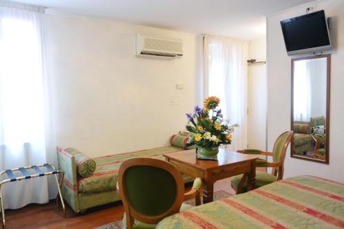 Habitación Cuádruple del hotel San Zulian. Foto 2