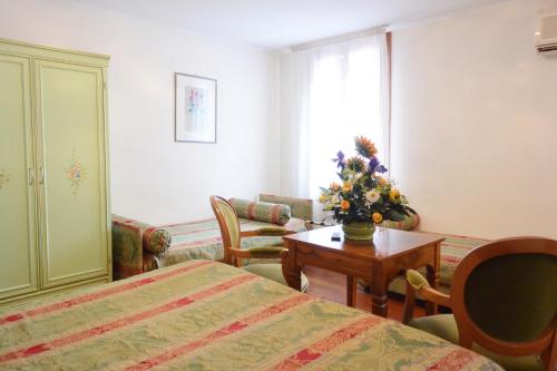 Habitación Cuádruple del hotel San Zulian. Foto 3