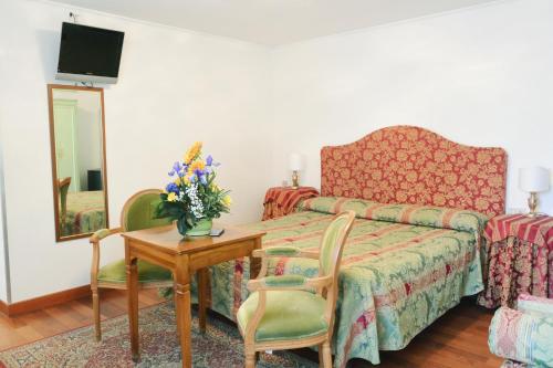 Habitación Cuádruple del hotel San Zulian. Foto 5
