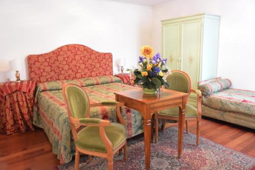 Habitación Cuádruple del hotel San Zulian. Foto 6