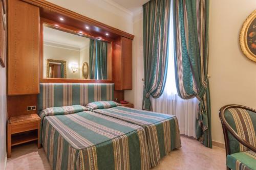 Habitación Doble Económica - 1 o 2 camas del hotel Raeli Archimede. Foto 8