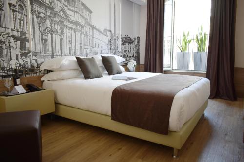 Habitación Doble Deluxe del hotel Raeli Archimede. Foto 3