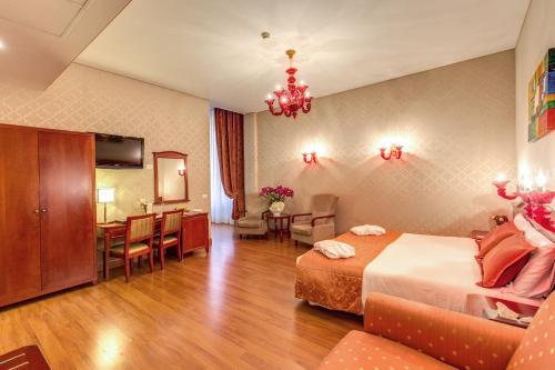 Habitación cuádruple del hotel Augusta Lucilla Palace. Foto 11